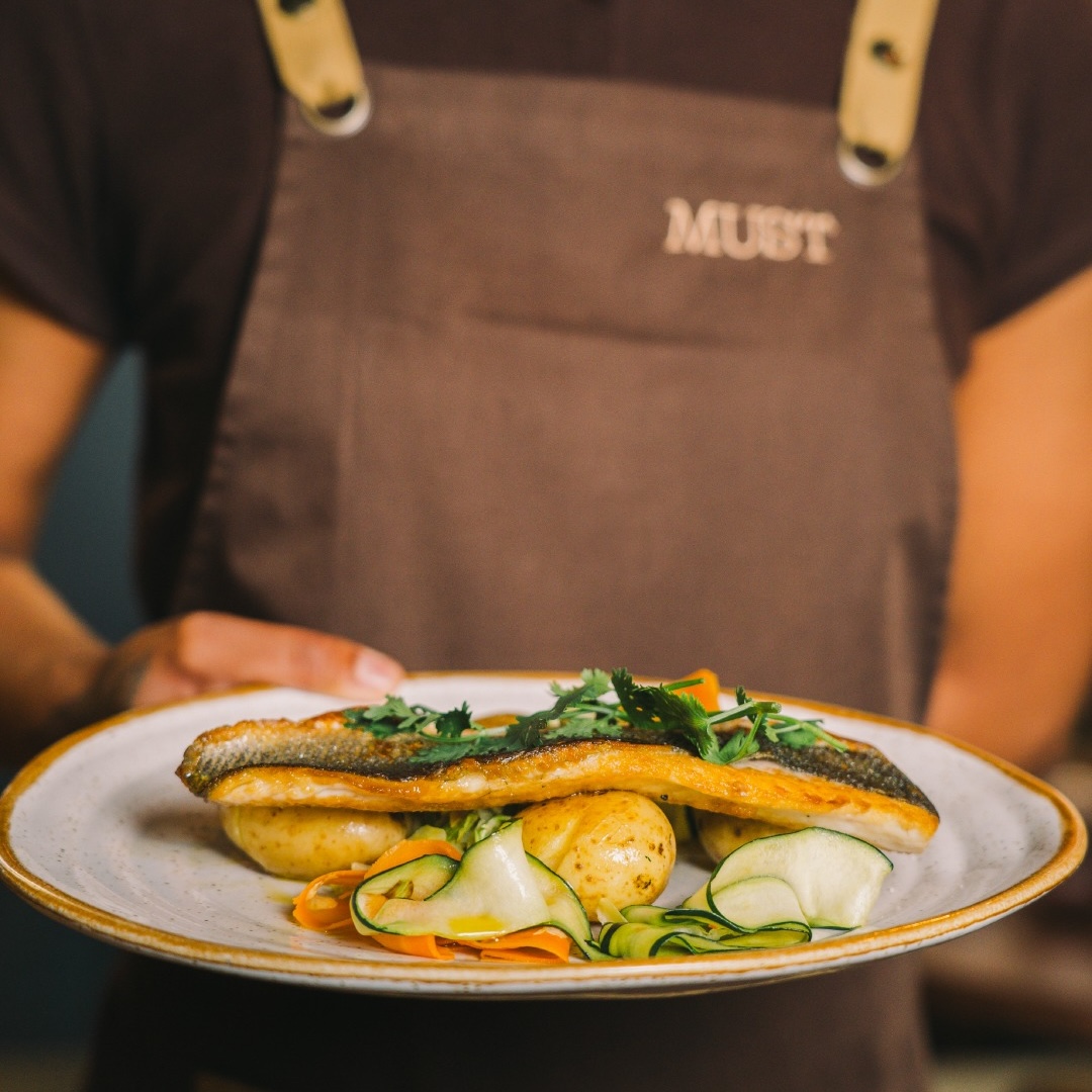 MUST chef plating a dish